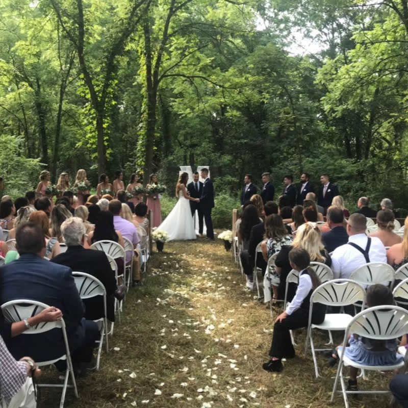 Hidden Irish Hill ceremony location surrounded by trees — our ceremony spot
